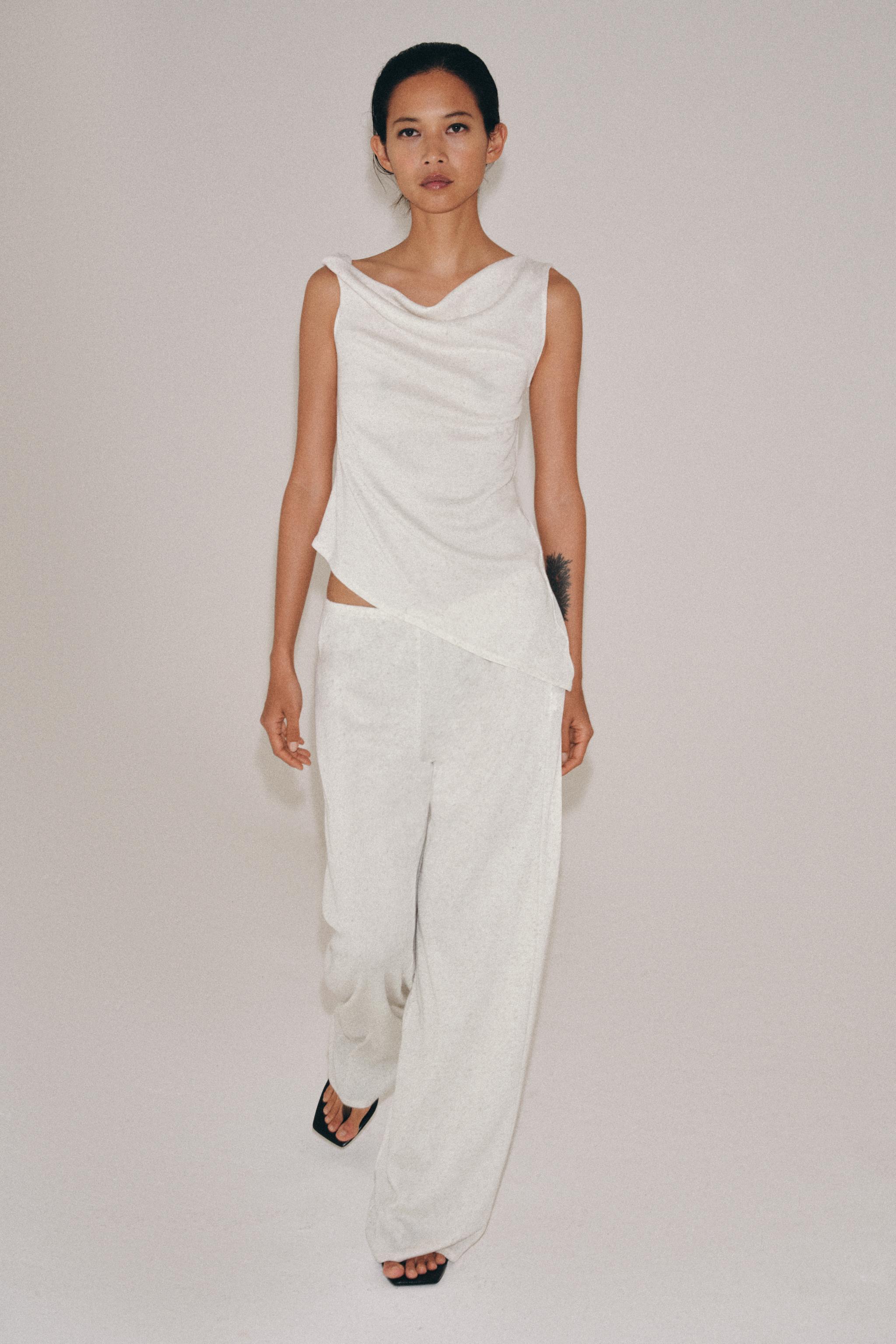 ASYMMETRIC RUSTIC TOP